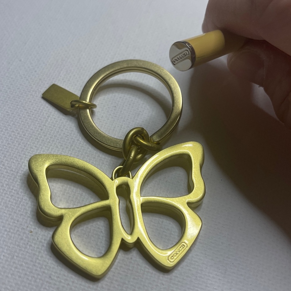 Coach Gold Butterfly Keychain and Cream Coach Pen - Picture 4 of 5
